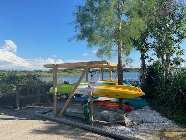 view of jungle gym with a water view