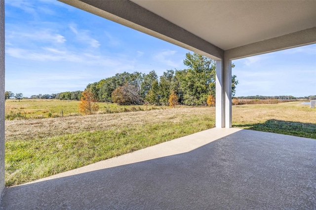 view of patio with a rural view