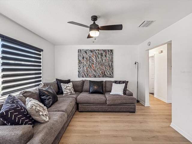 2000 57th St N, Saint Petersburg, FL 33710 - living room featuring ceiling fan and light hardwood / wood-style floors