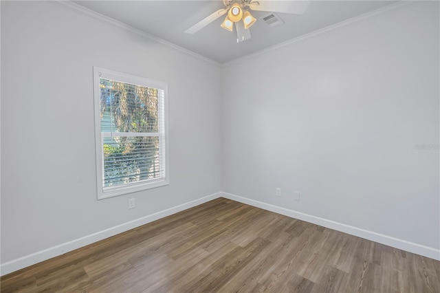 unfurnished room featuring crown molding, ceiling fan, and hardwood / wood-style flooring