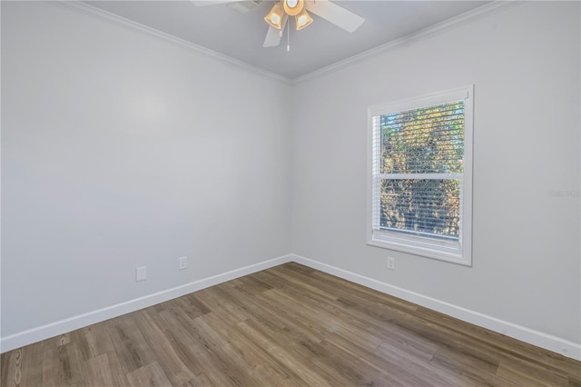 unfurnished room with crown molding, ceiling fan, and hardwood / wood-style flooring