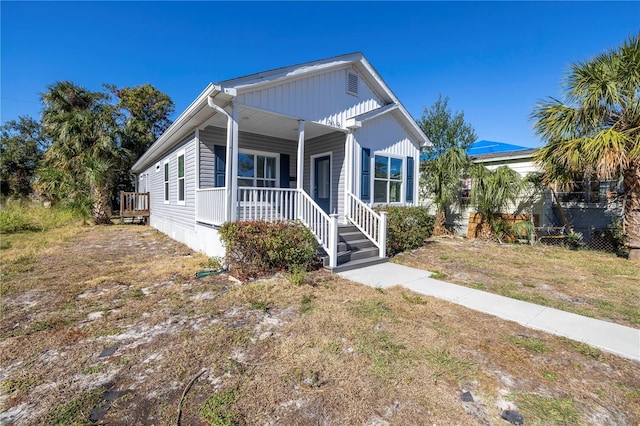 view of front of property featuring covered porch