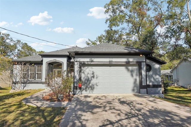 view of front facade featuring a garage and a front yard