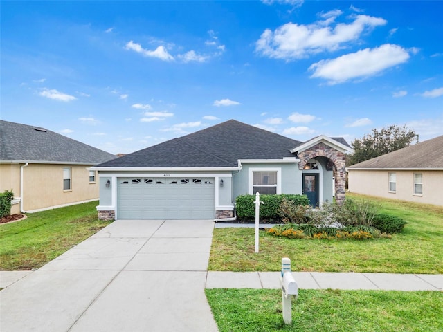 single story home featuring a front yard and a garage