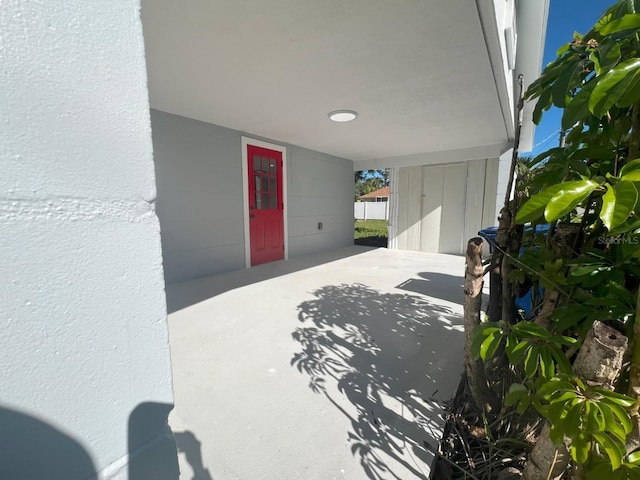 entrance to property with a patio