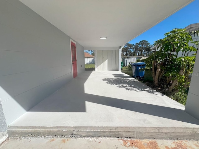 735 Bertrend St, Englewood, FL 34223 - view of patio / terrace with a carport