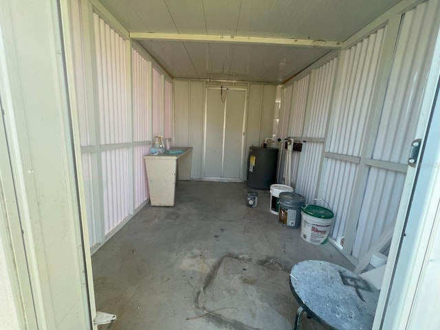 735 Bertrend St, Englewood, FL 34223 - storage room with electric water heater