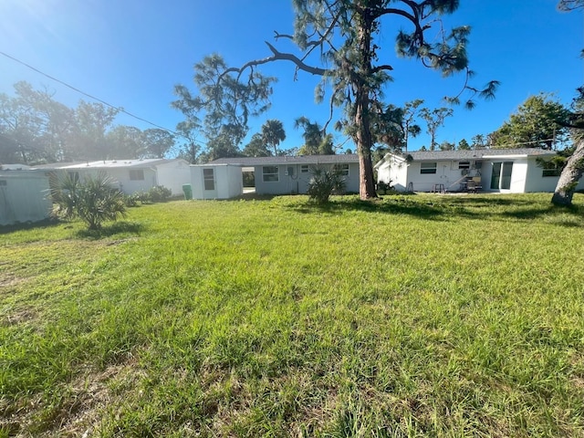 735 Bertrend St, Englewood, FL 34223 - view of green lawn