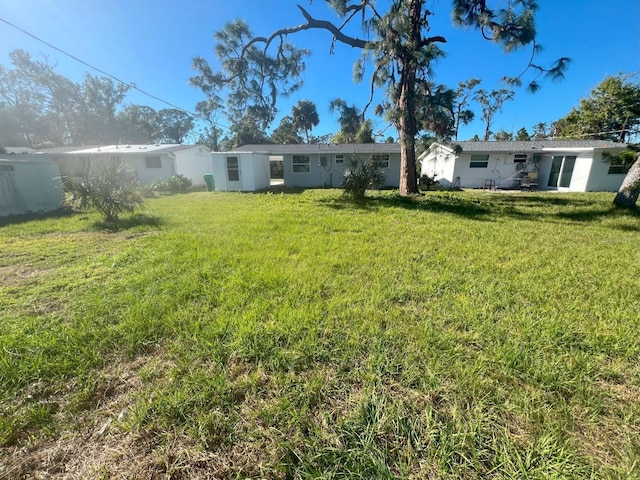 735 Bertrend St, Englewood, FL 34223 - view of green lawn