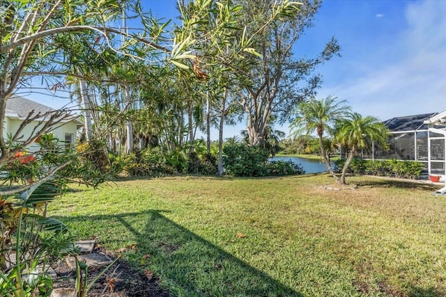 view of yard with a water view