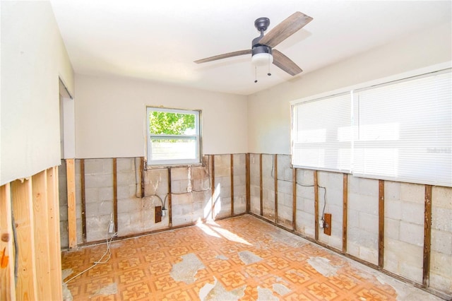 unfurnished room featuring ceiling fan