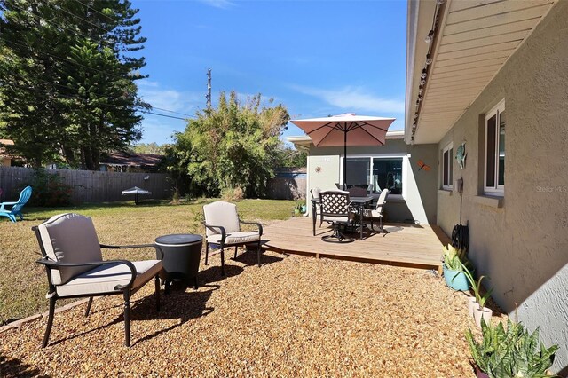 view of yard with a deck