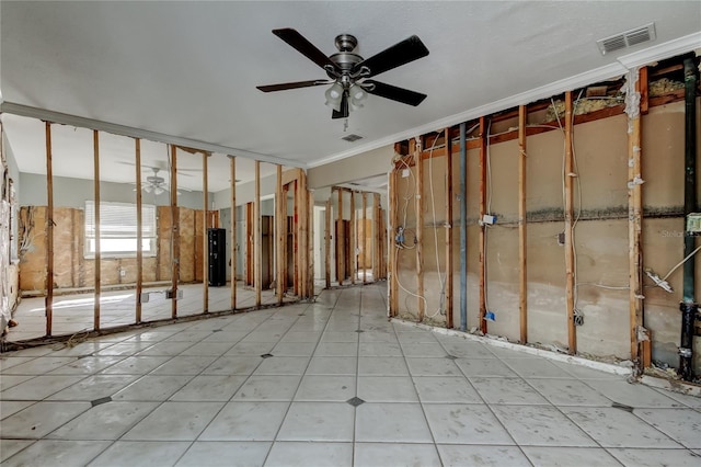 misc room featuring ornamental molding, visible vents, and ceiling fan