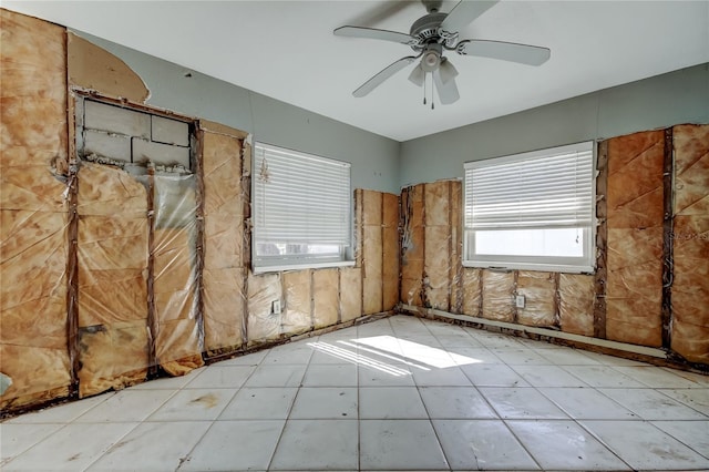 unfurnished room with ceiling fan