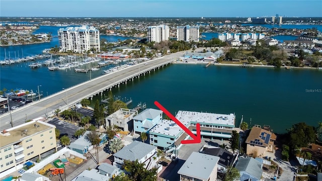 aerial view with a water view and a city view