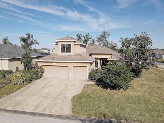 view of front of home with a garage and a front lawn