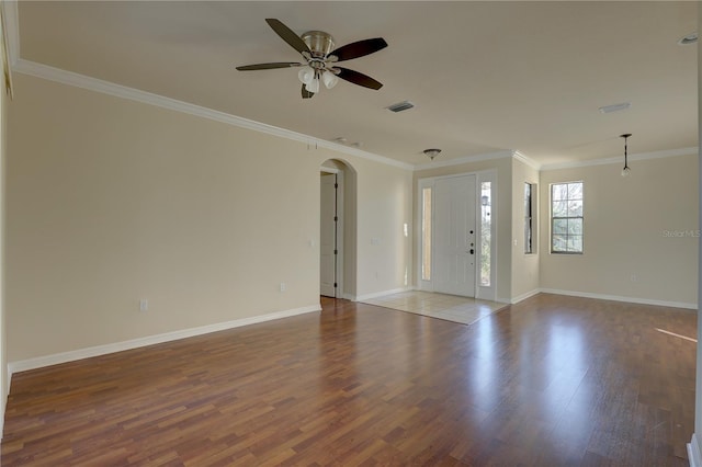 unfurnished room with crown molding, ceiling fan, and hardwood / wood-style flooring