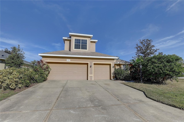 view of front of home with a garage