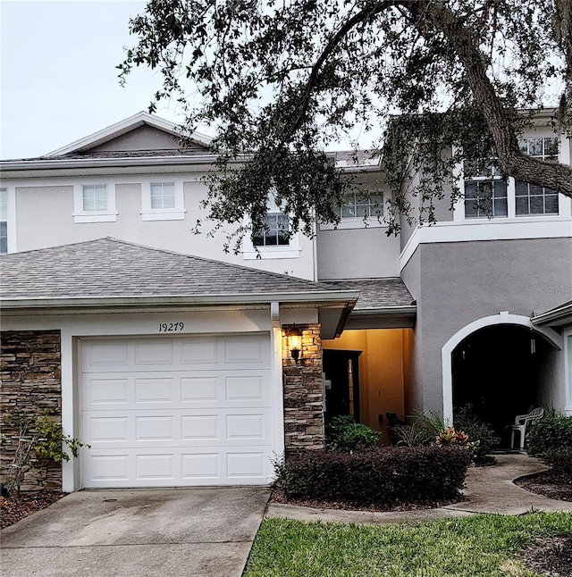 view of front of home with a garage