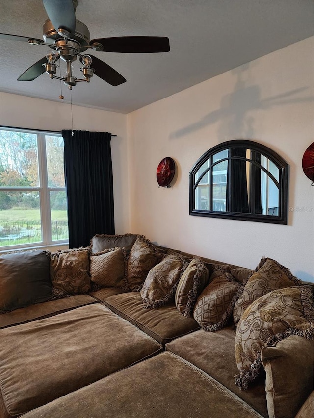 living room with ceiling fan