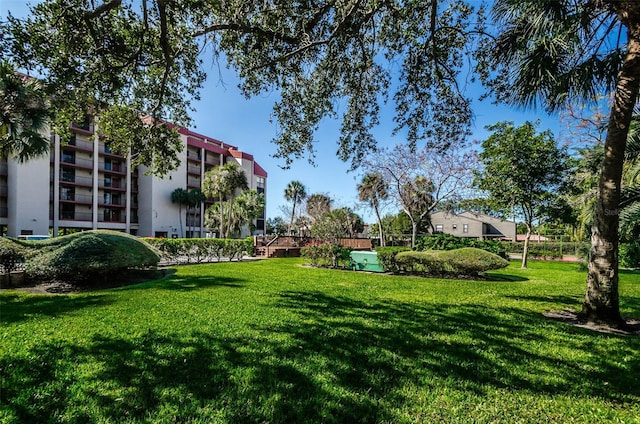 view of community with a yard