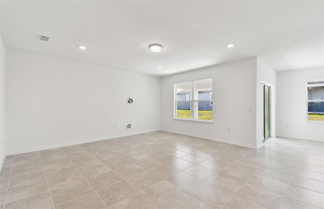 view of tiled spare room