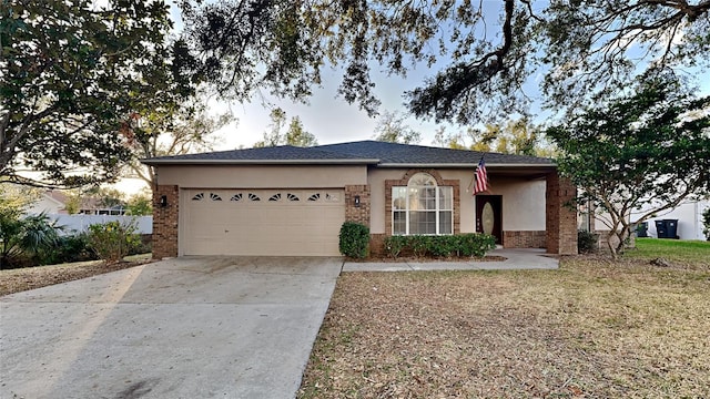 ranch-style house featuring a garage