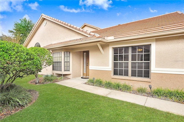 exterior space with a front yard