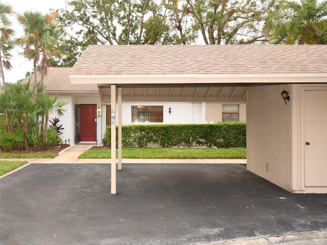 view of car parking with a carport