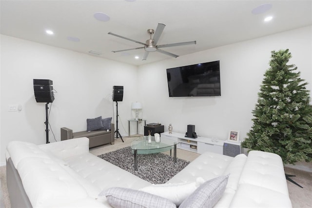 living room with light colored carpet and ceiling fan