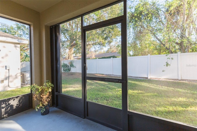 unfurnished sunroom with a healthy amount of sunlight