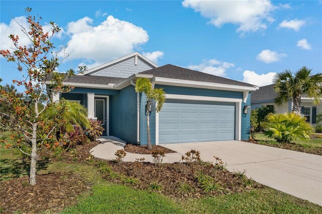 13584 Old Creek Ct, Parrish, FL 34219 - ranch-style home featuring a garage, driveway, and a shingled roof