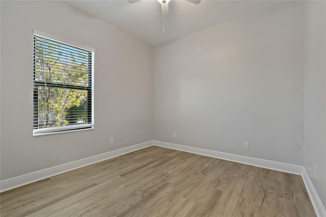 13584 Old Creek Ct, Parrish, FL 34219 - spare room featuring wood finished floors, baseboards, and ceiling fan