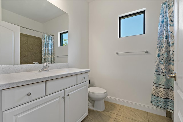 13584 Old Creek Ct, Parrish, FL 34219 - full bath featuring vanity, toilet, tile patterned flooring, and plenty of natural light