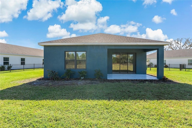 13584 Old Creek Ct, Parrish, FL 34219 - back of property featuring stucco siding and a patio area