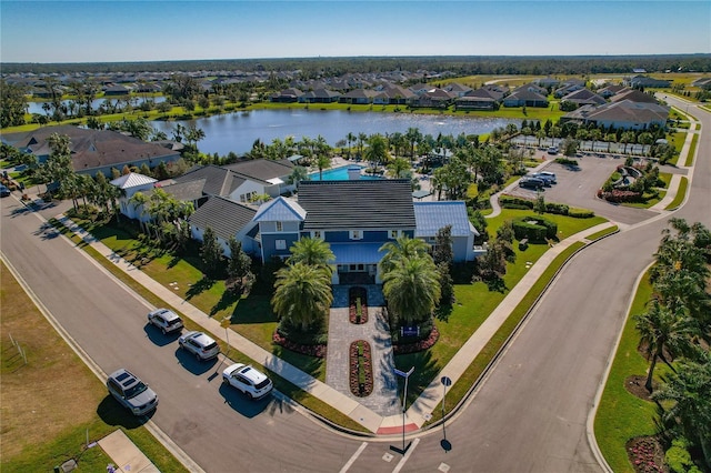 drone / aerial view with a water view