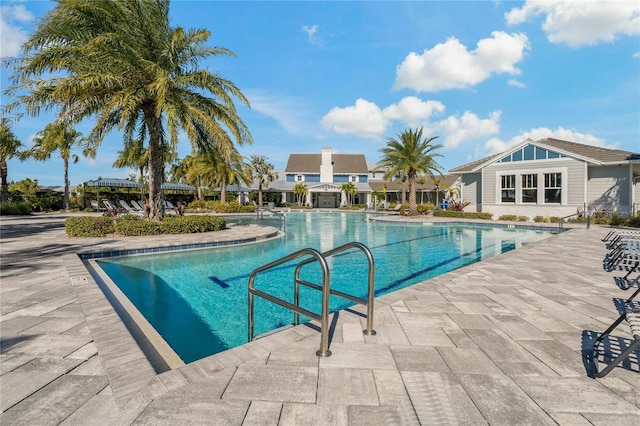 view of pool featuring a patio area