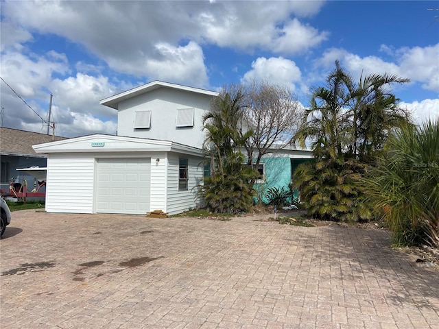 view of front of property with a garage