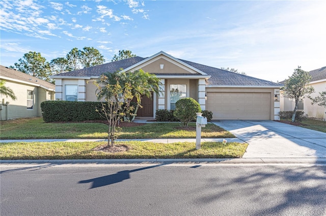 3602 Juneberry Dr, Wesley Chapel, FL 33543 - ranch-style house featuring concrete driveway, a garage, stucco siding, and a front yard