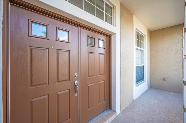 entrance to property with a porch