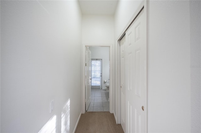 3602 Juneberry Dr, Wesley Chapel, FL 33543 - hall featuring carpet floors and tile patterned floors