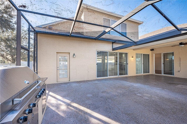 3602 Juneberry Dr, Wesley Chapel, FL 33543 - rear view of property with a lanai, a patio, and stucco siding