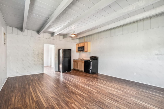 unfurnished living room with beamed ceiling and dark wood-type flooring