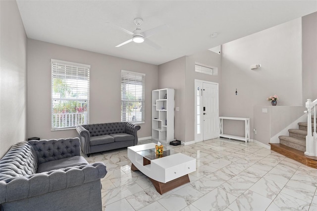 living room featuring ceiling fan