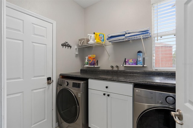 laundry area with washer / dryer