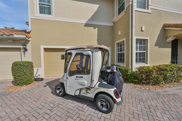 exterior space with a garage