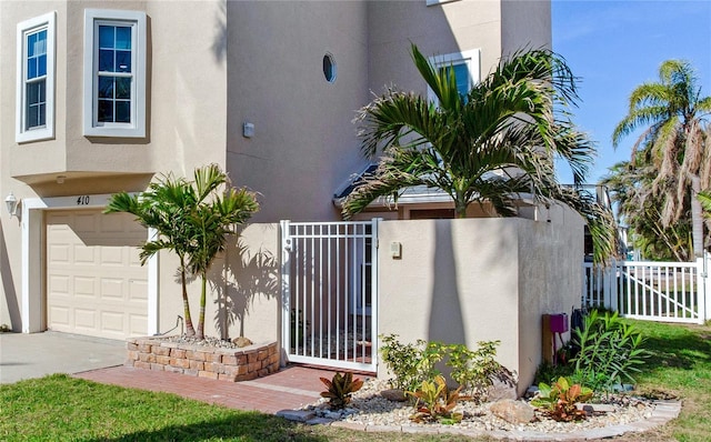 view of side of property featuring a garage