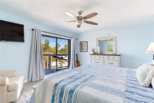 bedroom featuring access to outside, ceiling fan, and light hardwood / wood-style floors