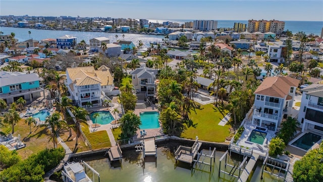 birds eye view of property featuring a water view