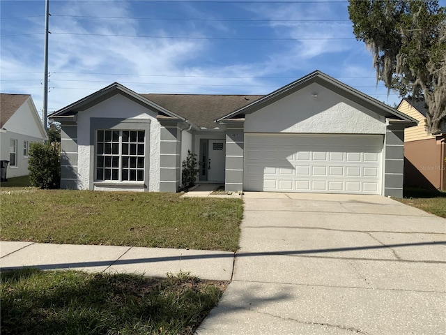 ranch-style home with a garage and a front lawn